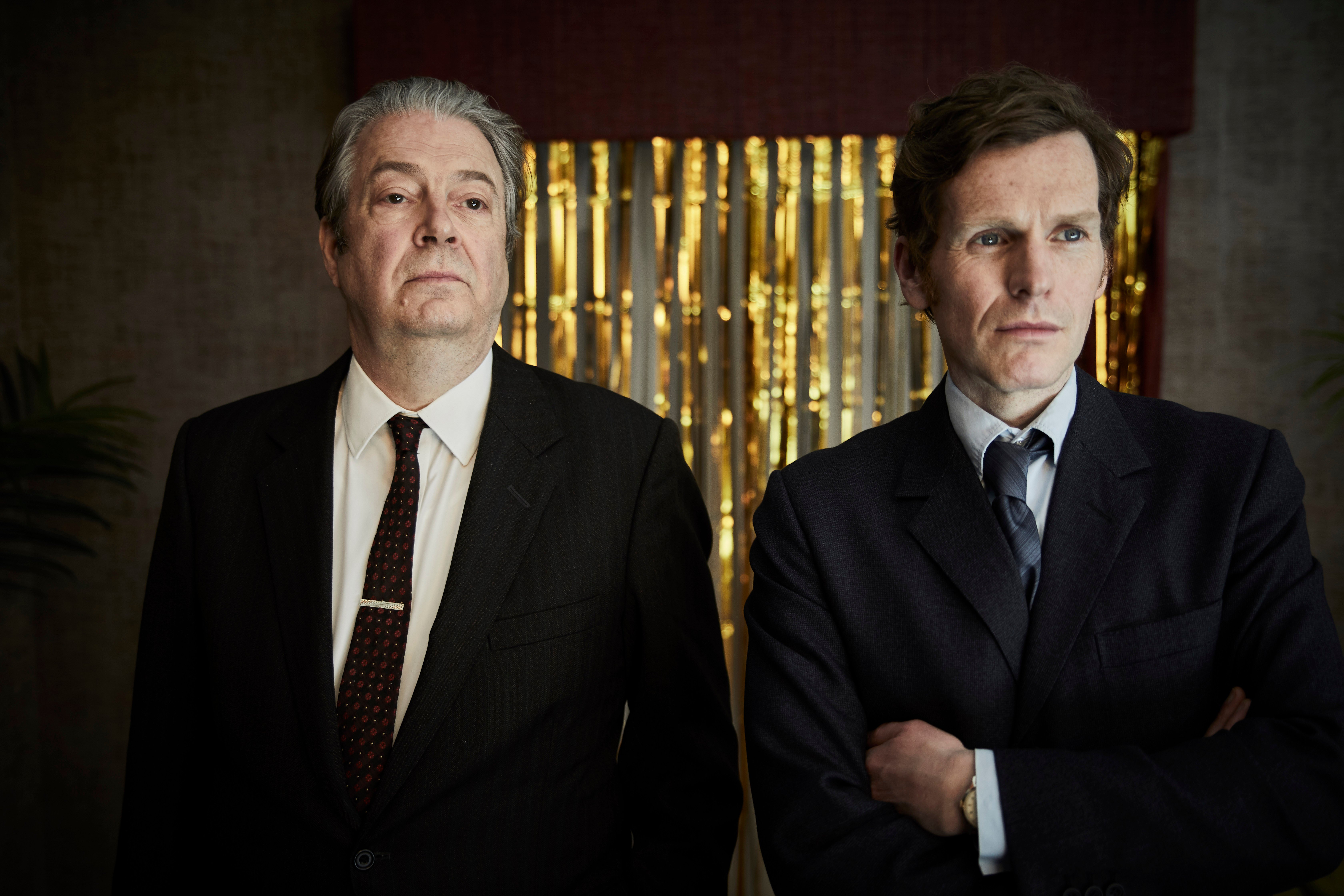 Roger Allam and Shaun Evans, both in dark jackets and ties, in promotional shot for 'Endeavour' Season 8 on PBS