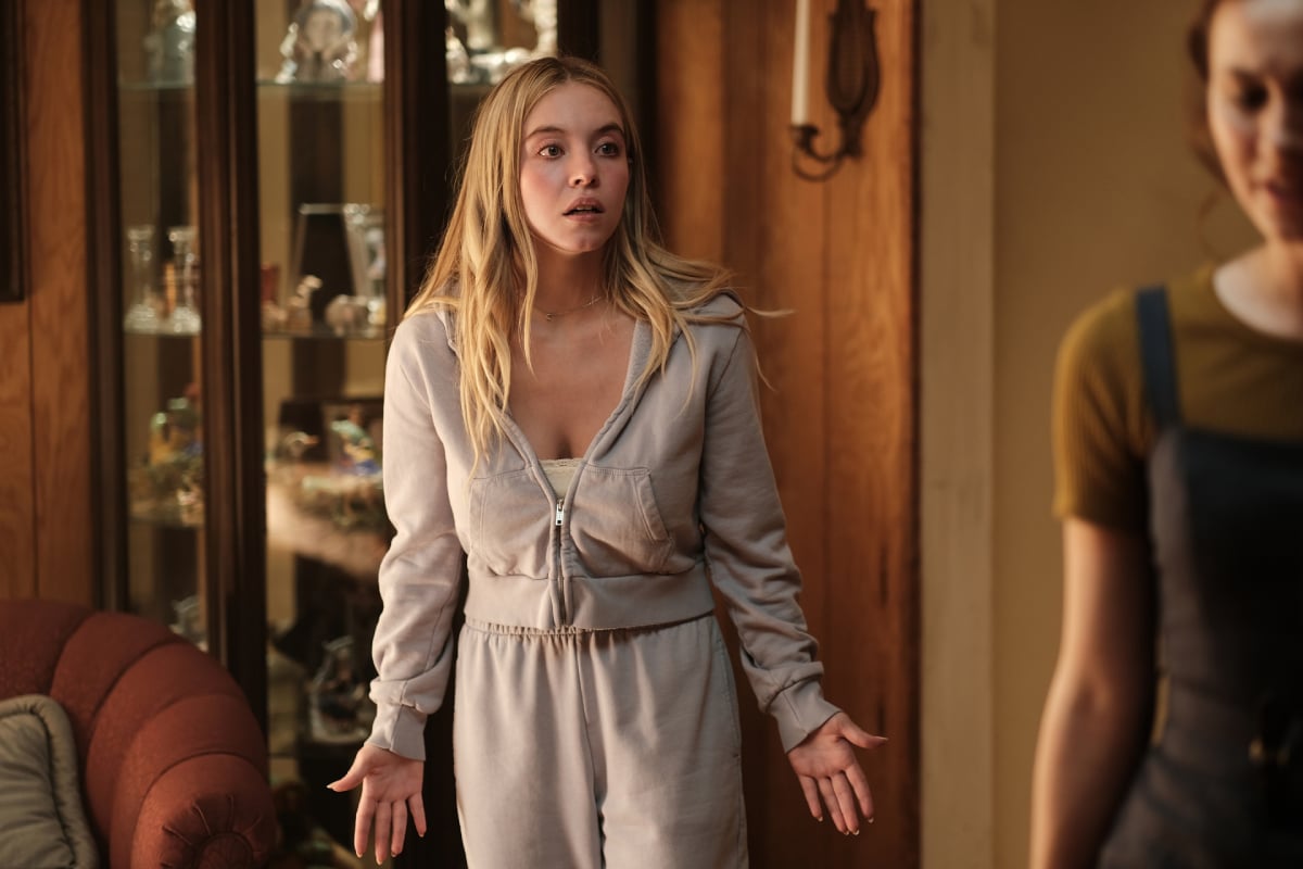 Sydney Sweeney as Cassie Howard in Euphoria Season 2. Cassie wears a jacket and sweatpants and appears to not have any makeup on. 