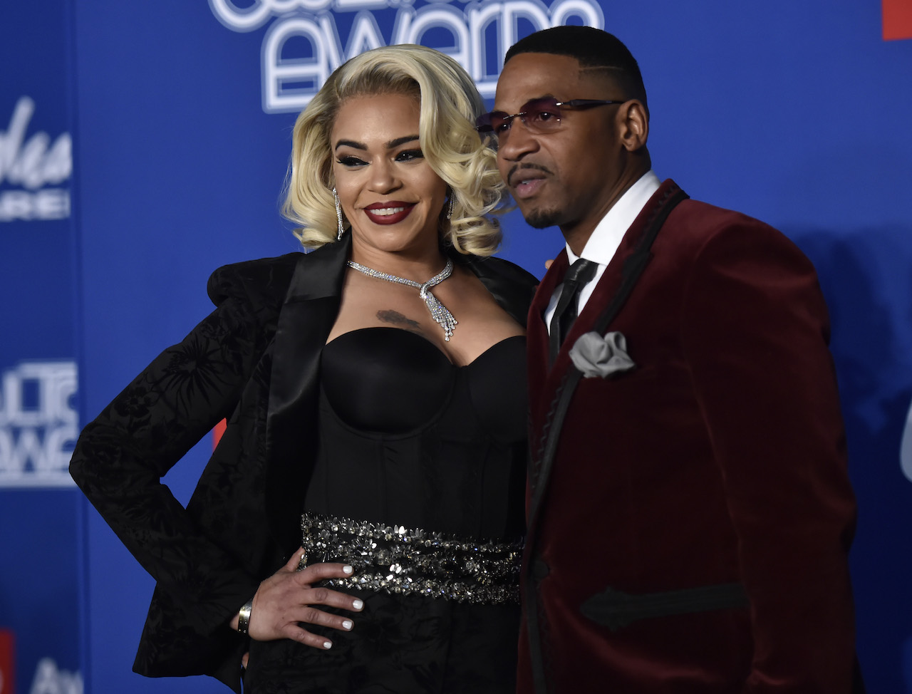 Faith Evans and Stevie J pose for photo - the former couple are in the middle of a divorce