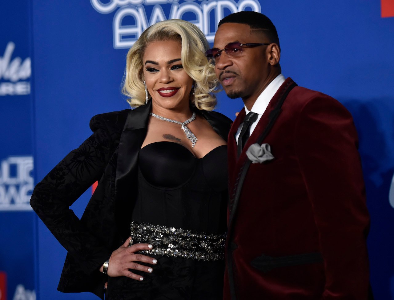 Faith Evans and Stevie J pose for photo - the former couple are in the middle of a divorce