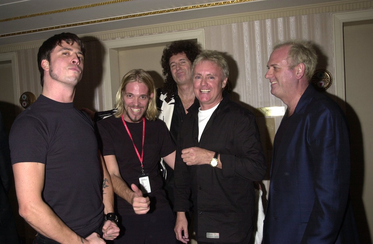 Dave Grohl and Taylor Hawkins with members of Queen at the 2001 Rock & Roll Hall of Fame inductions.