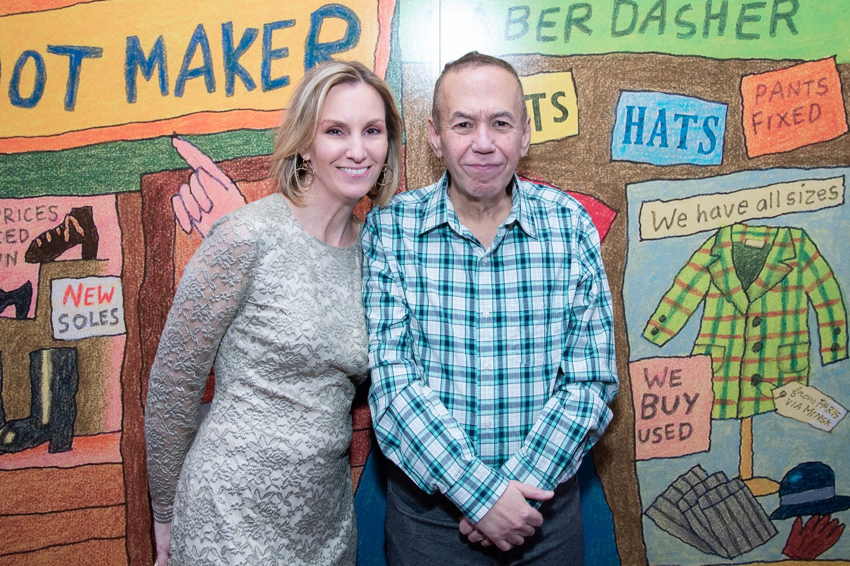 Gilbert Gottfried and his wife, Dara Kravitz, standing together and smiling