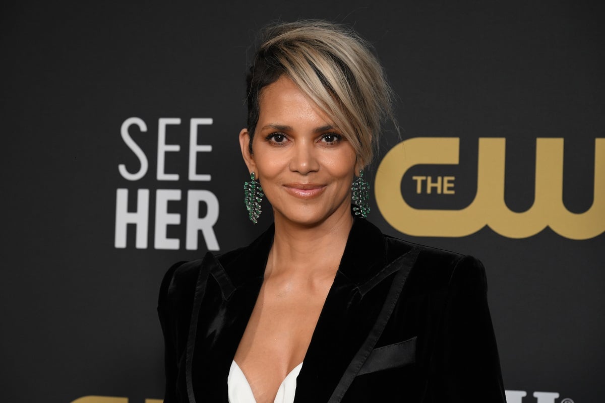 Halle Berry smiling while wearing a black blazer.