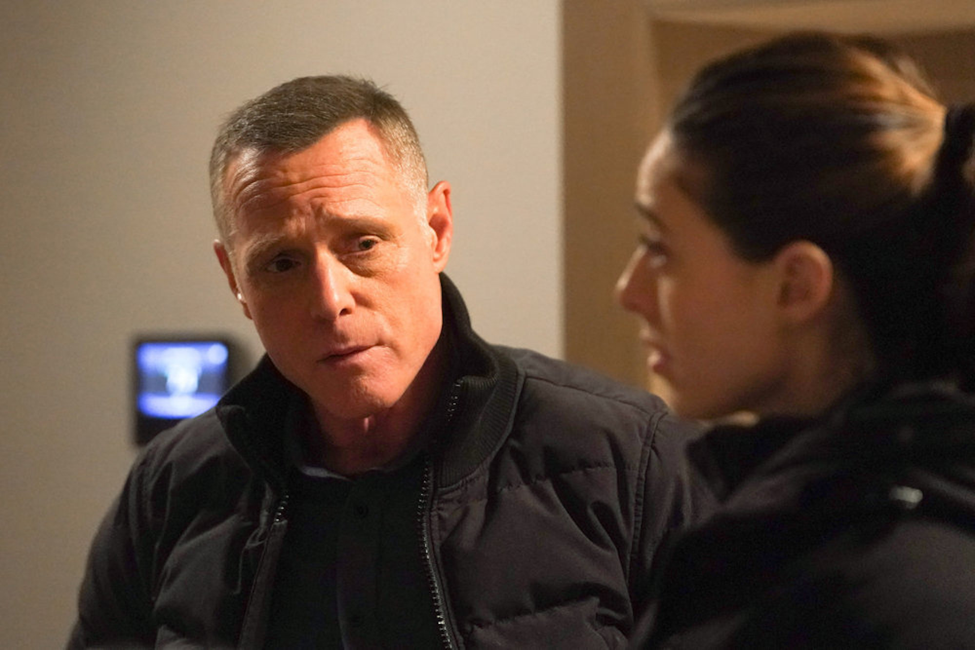 Hank Voight looking at Kim Burgess in 'Chicago P.D.' Season 9