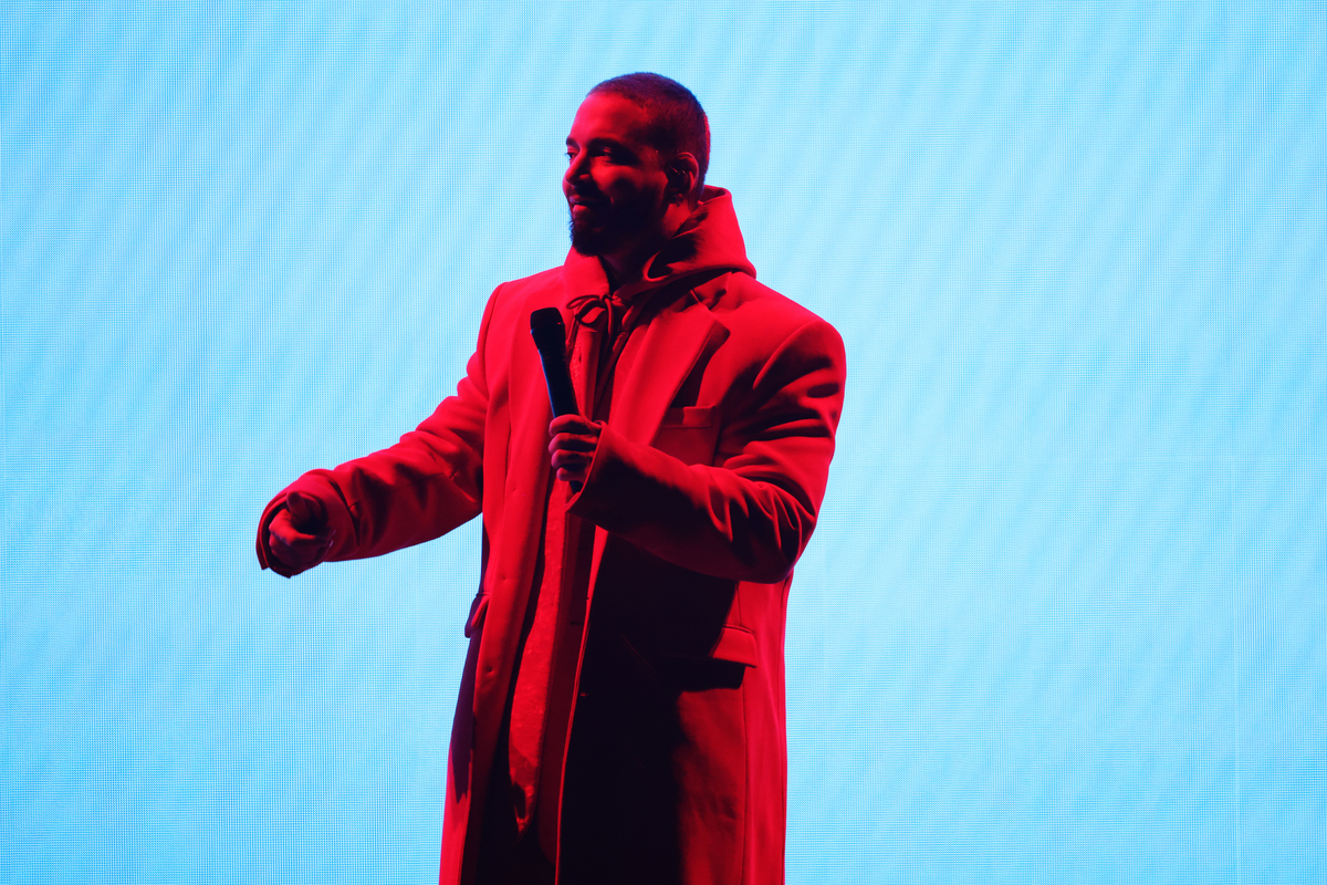 Standing in front of a blue screen, J Balvin performs onstage at the 64th Annual Grammy Awards in Las Vegas, NV.