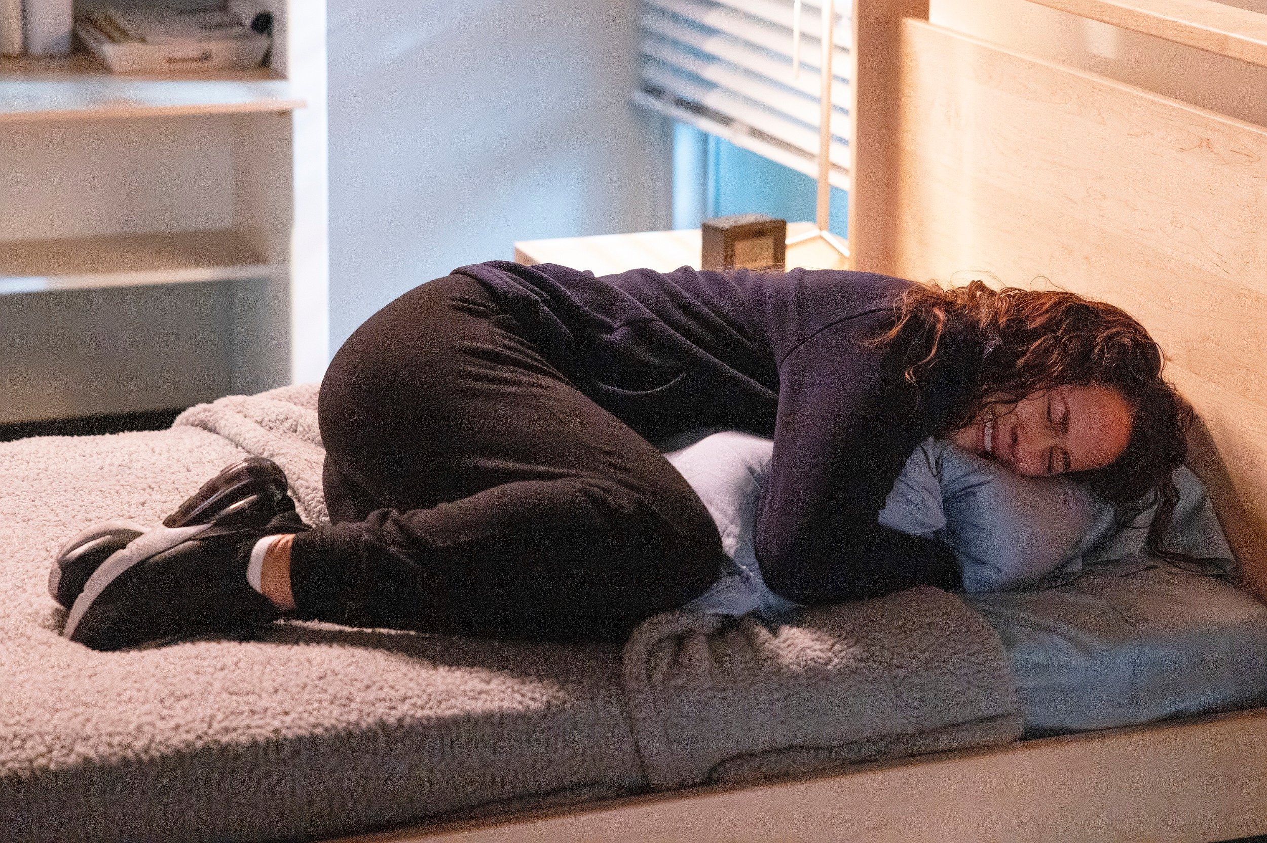 'Station 19': Jaina Lee Ortiz laying on a bed as Andy Herrera