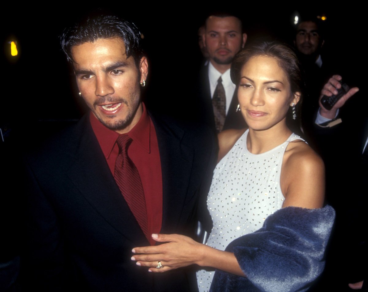 Jennifer Lopez and Ojani Noa talk to the media at Hollywood's Pacific Cinerama Dome in 1997