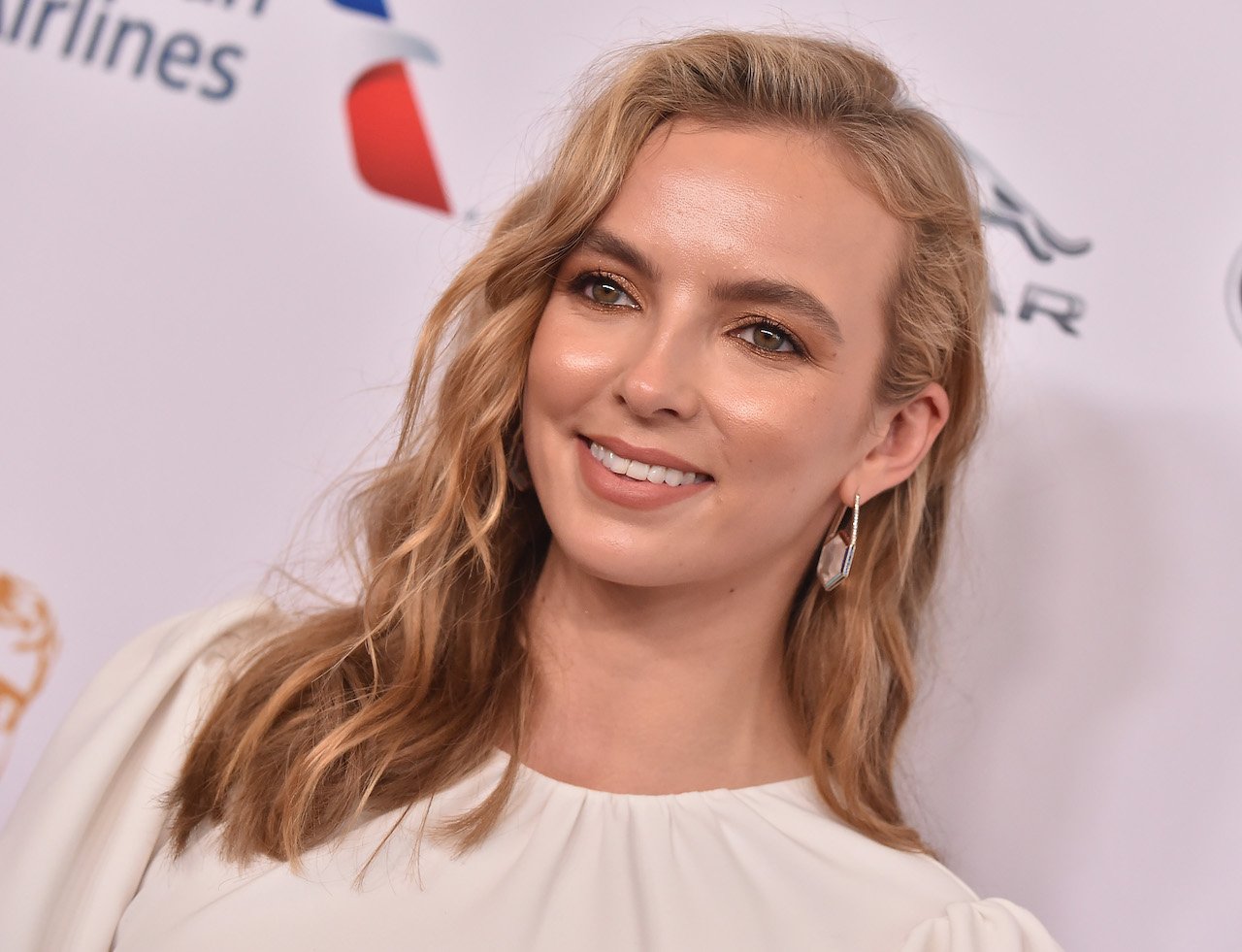 Jodie Comer smiles for a picture