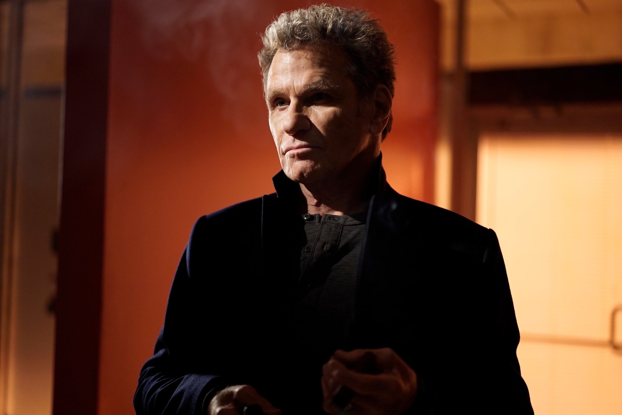 John Kreese (Martin Kove) arrives in the Cobra Kai dojo