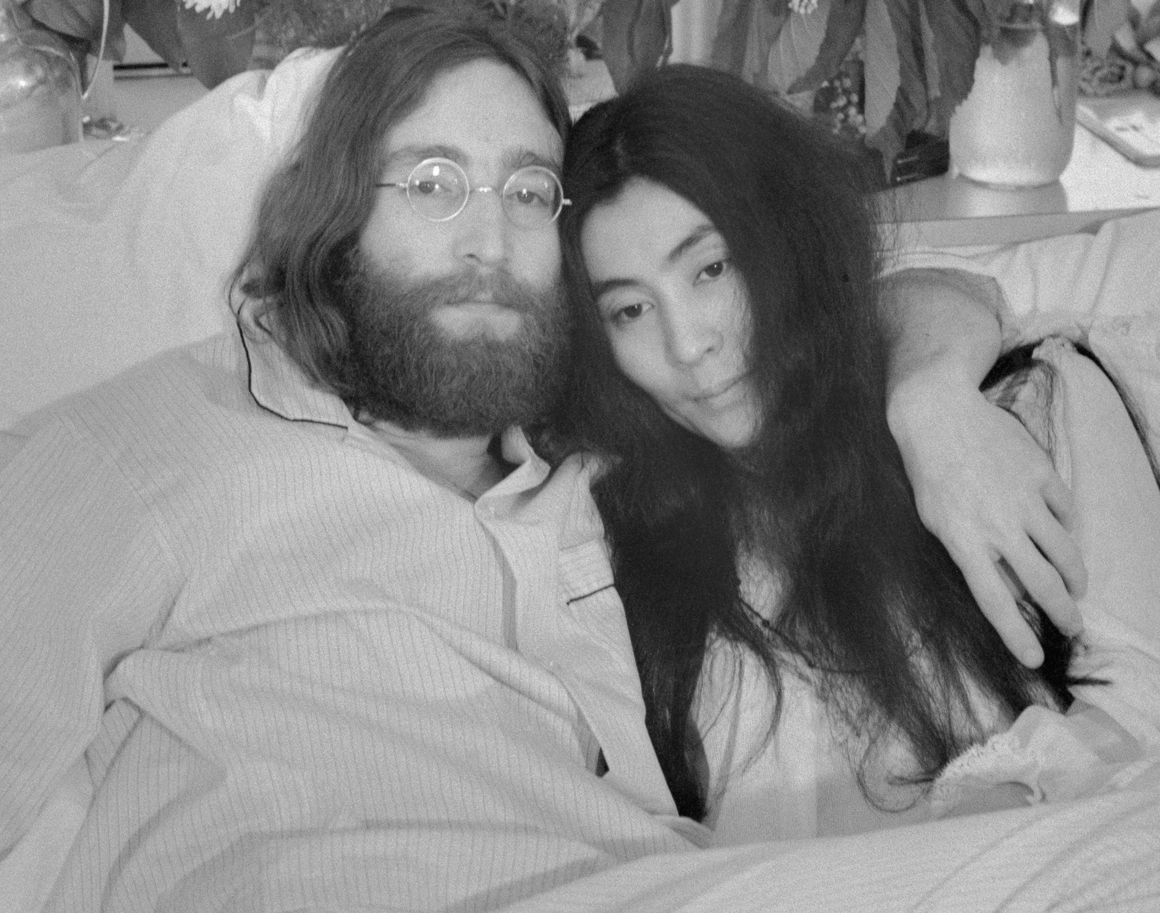 John Lennon and Yoko Ono wearing pajamas