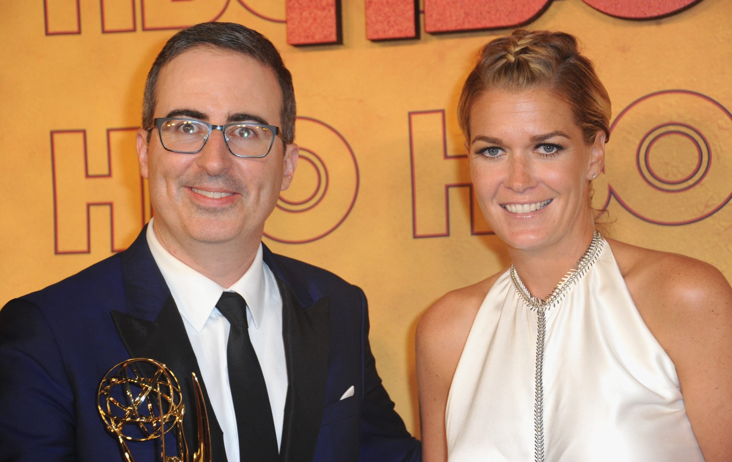 Talk show host John Oliver and wife Kate Norley arrive for the reception of the HBO Post Emmy Awards at The Plaza at the Pacific Design Center on September 17, 2017 in Los Angeles, California.,