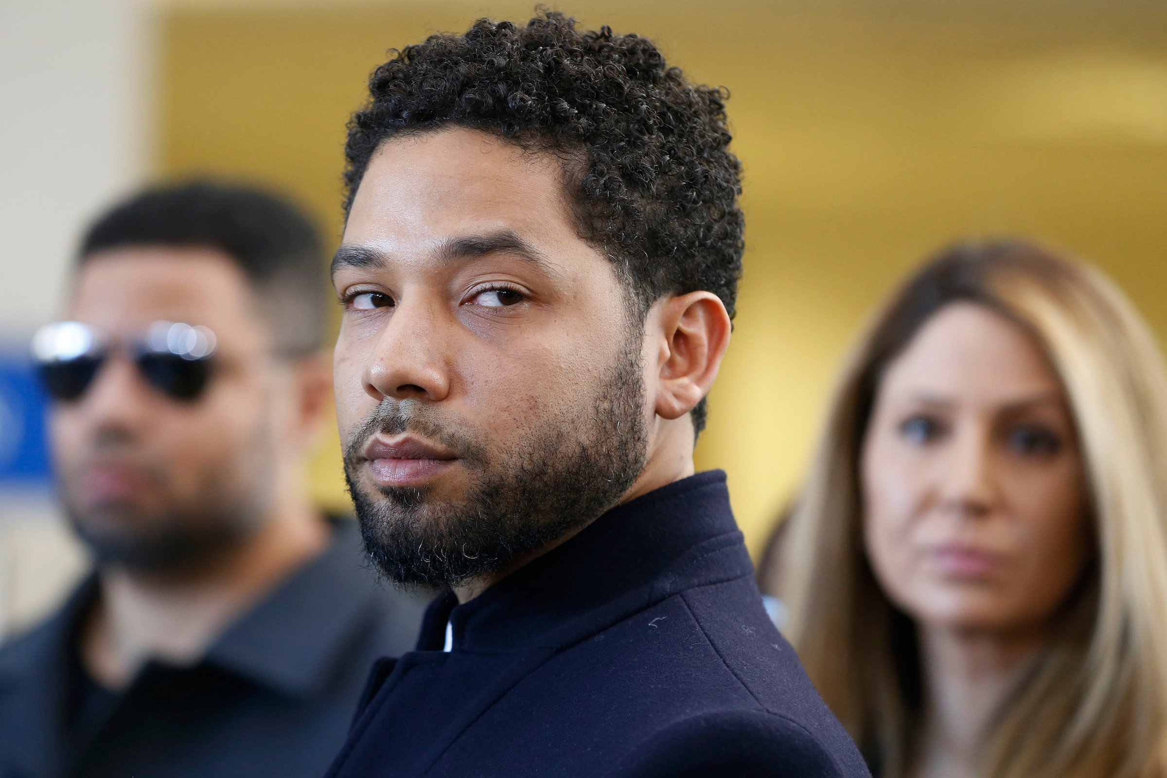 Jussie Smollett wearing a suit