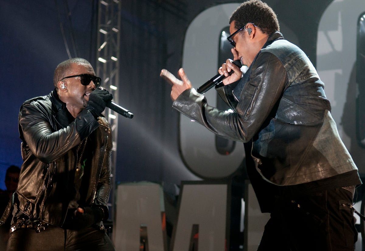Kanye West and Jay-Z wear black leather jackets and sunglasses and perform on stage at VEVO Power Station in Austin, TX.