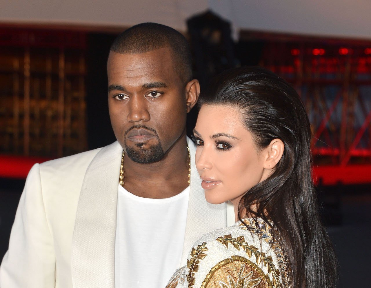 Kanye West and Kim Kardashian pose on the red carpet
