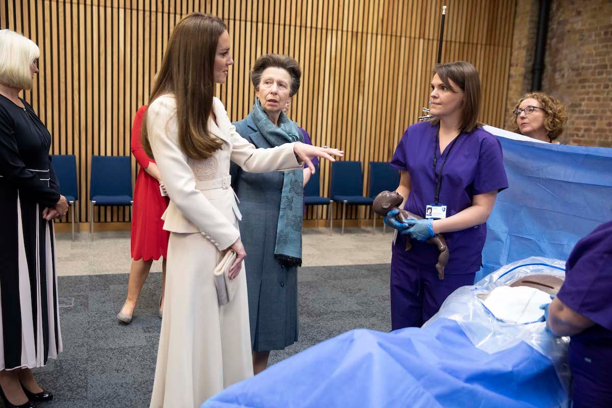 Kate Middleton and Princess Anne, during their joint engagement, as they watch a demonstration