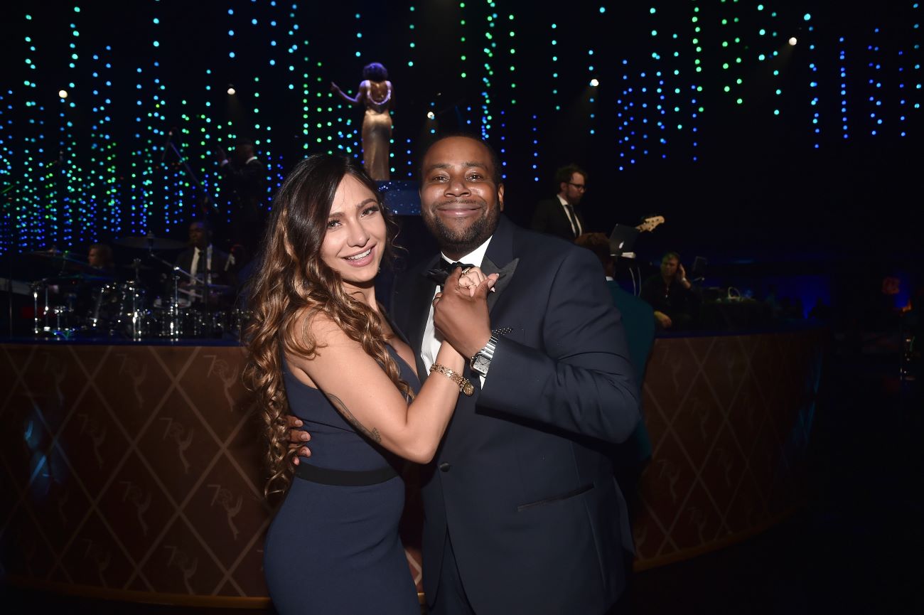 Kenan Thompson and his wife Christina Evangeline embrace at the Creative Arts Ball.