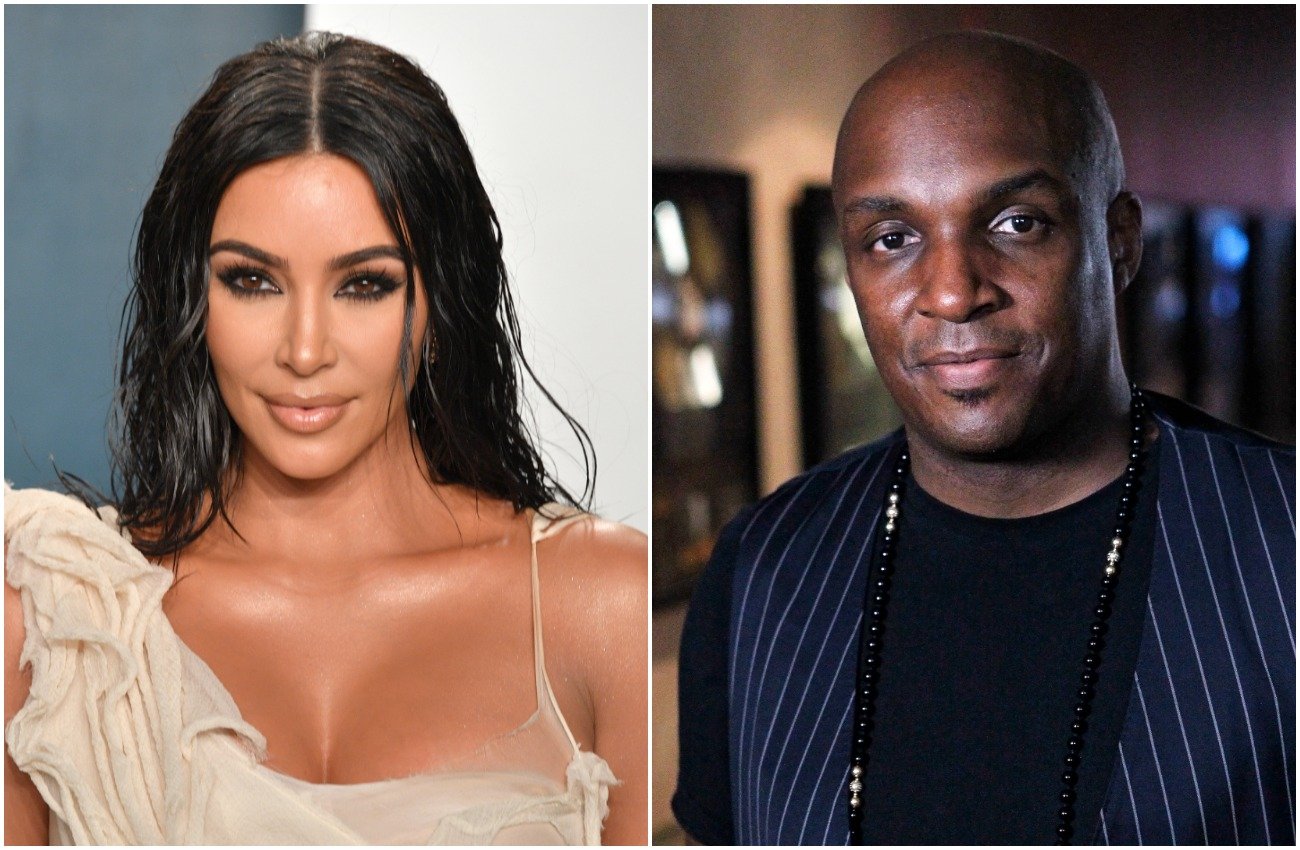 Kim Kardashian wearing an off-white outfit and standing in front of a dark gray and white background. Damon Thomas wearing a black outfit and looking on in front of a dark background