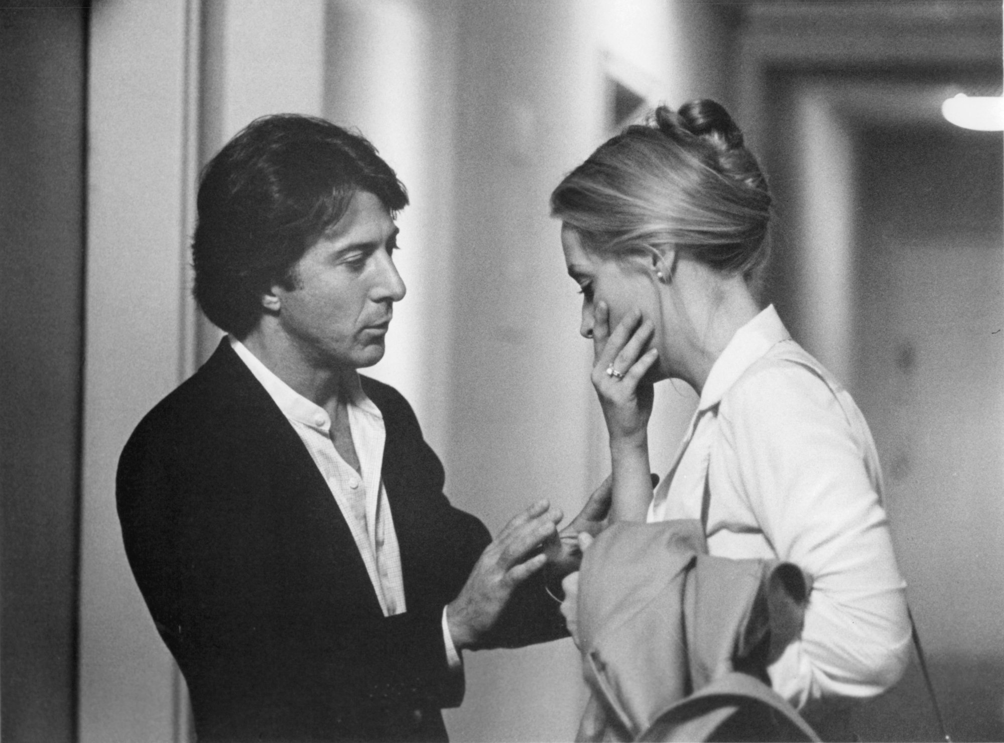 'Kramer vs. Kramer' Dustin Hoffman as Ted Kramer and Meryl Streep as Joanna with her holding her mouth over her mouth while he tries to console her