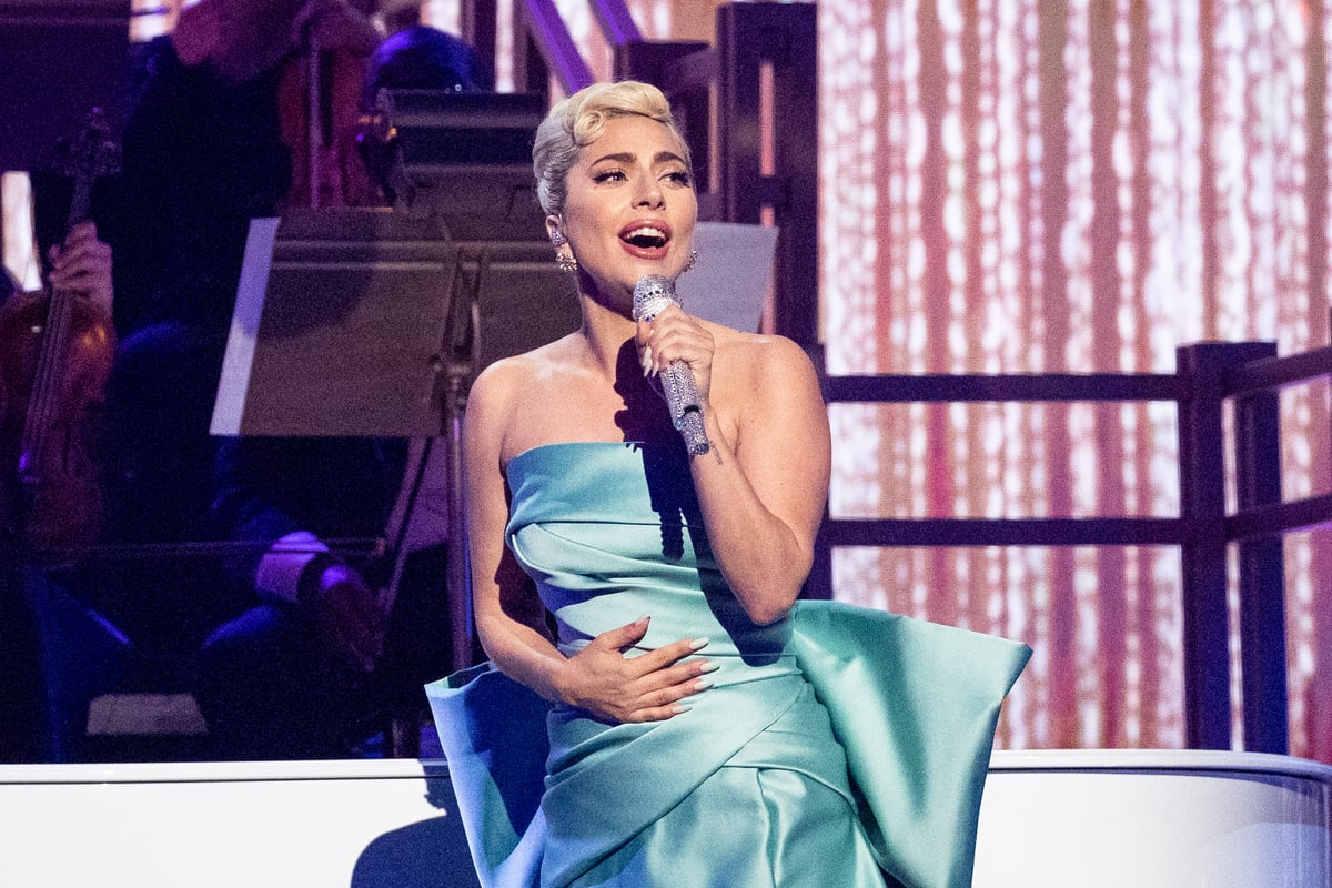 Wearing a strapless green dress, Lady Gaga performs on state at the 64th Annual Grammy Awards in Las Vegas, NV.