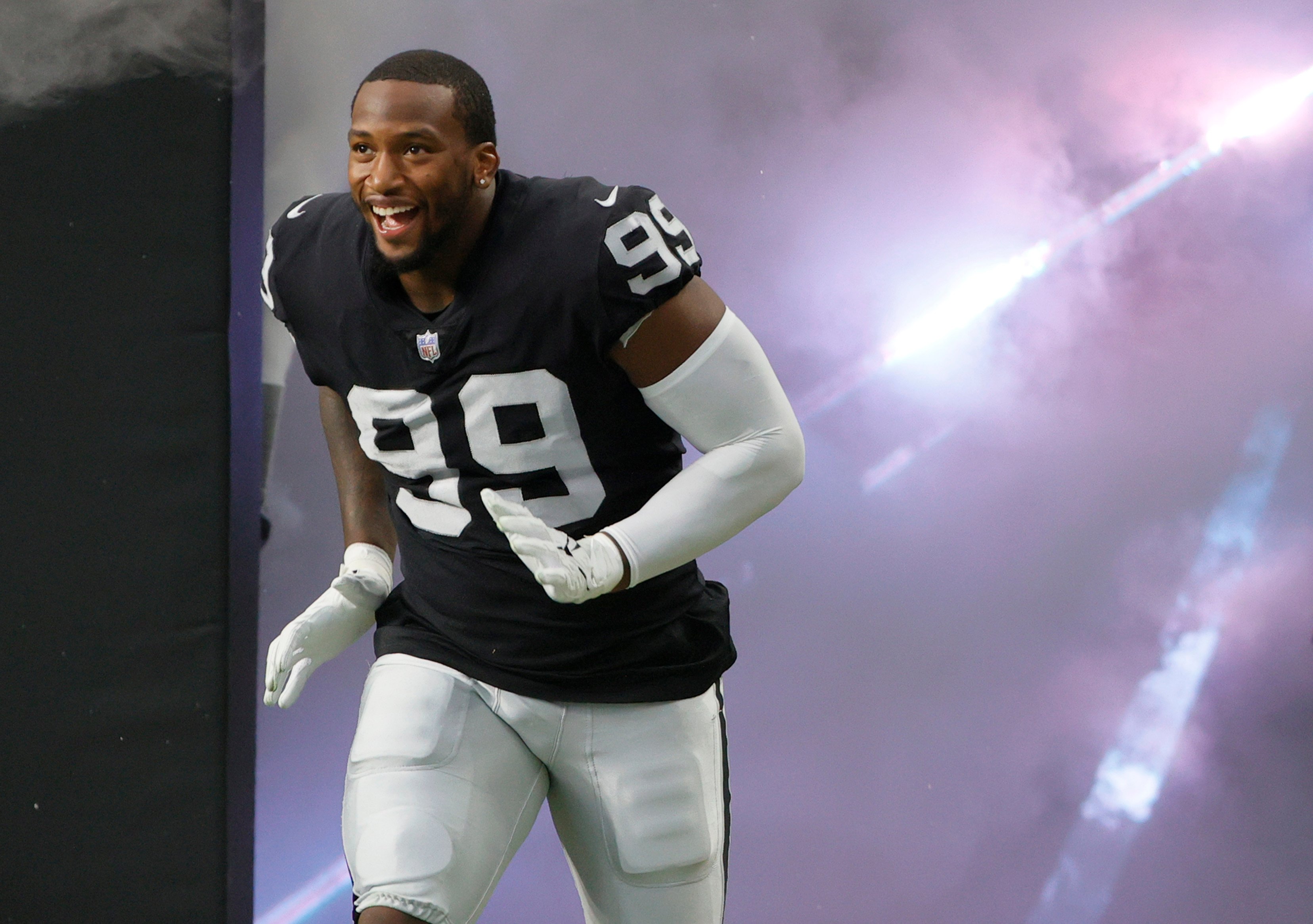 Las Vegas Raiders defensive end Clelin Ferrell, who gave an interview to Showbiz Cheat Sheet, smiling as he's introduced before a preseason game
