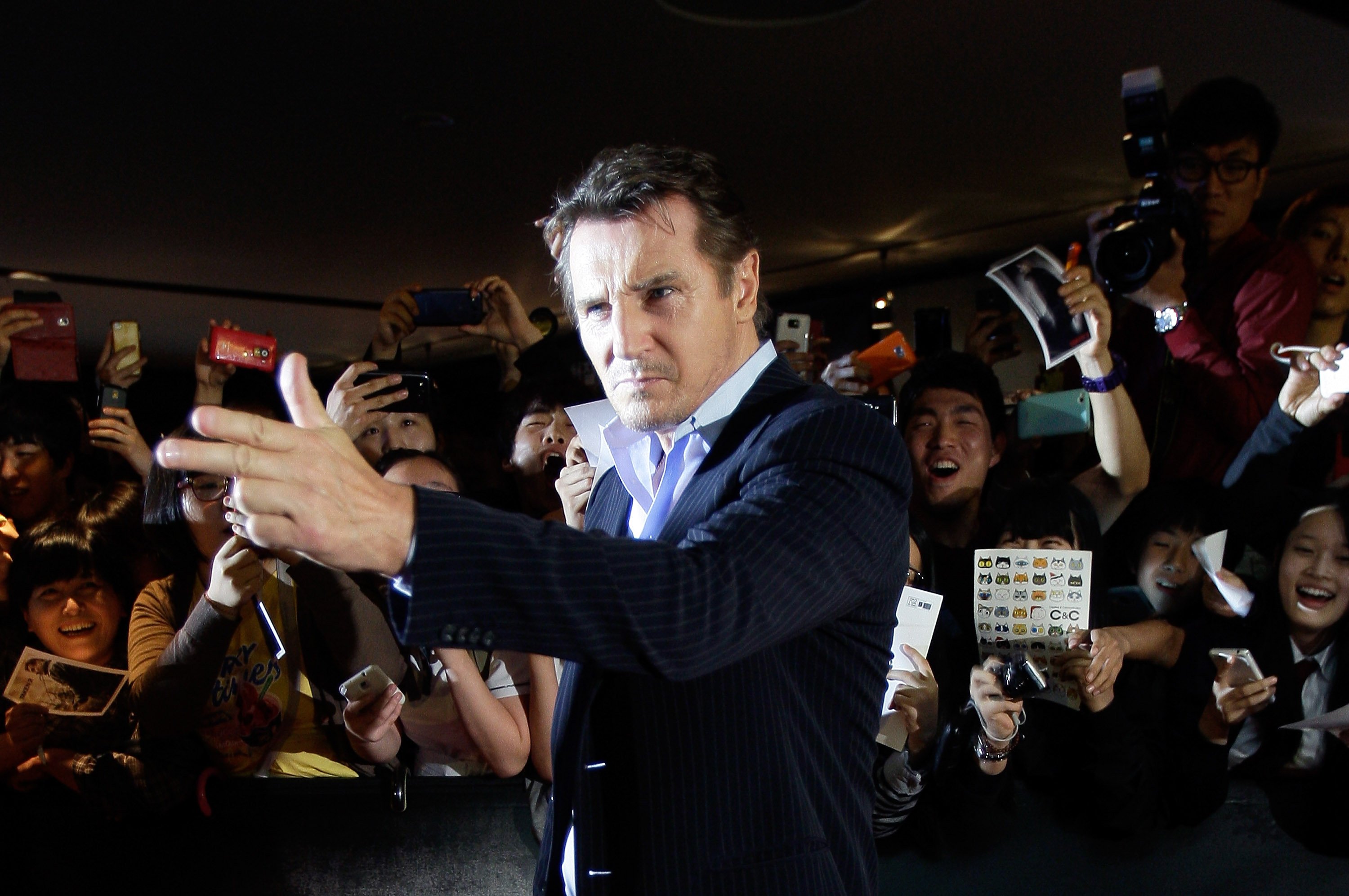 Liam Neeson attends the South Korea premiere of his movie Taken 2