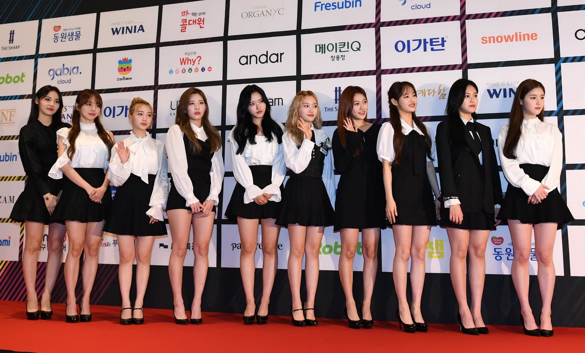 Dressed in black and white, Loona attends the Korean Brand Customer Loyalty Award in Seoul, South Korea.