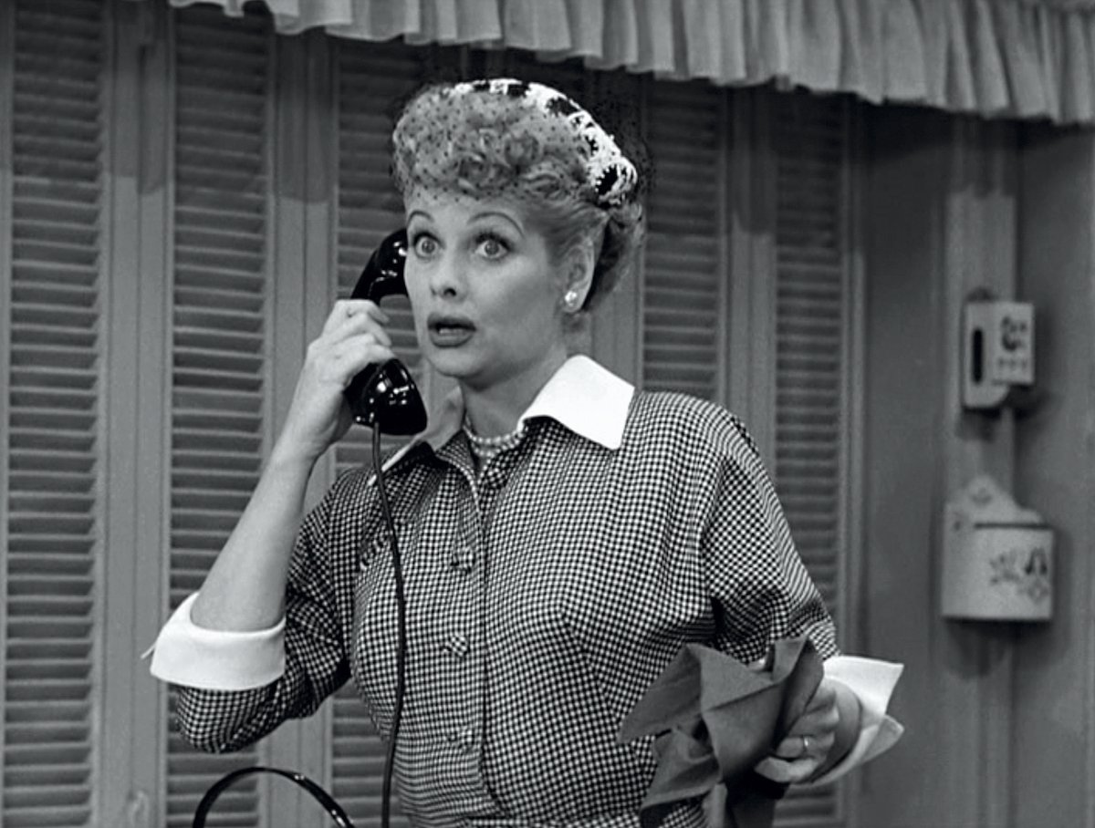 Lucille Ball as Lucy Ricardo, talking on the phone