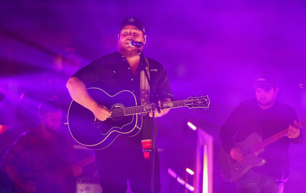 Luke Combs performing on stage