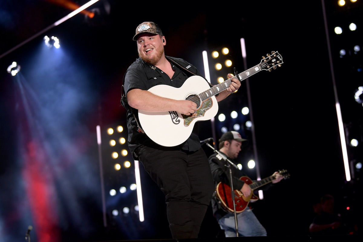 Luke Combs performing on stage