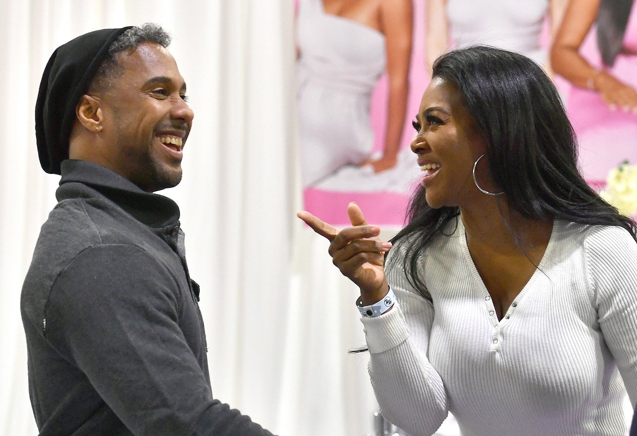 Marc Daly and Kenya Moore during 'RHOA' taping - their marriage ended during filming 'RHOA' Season 11