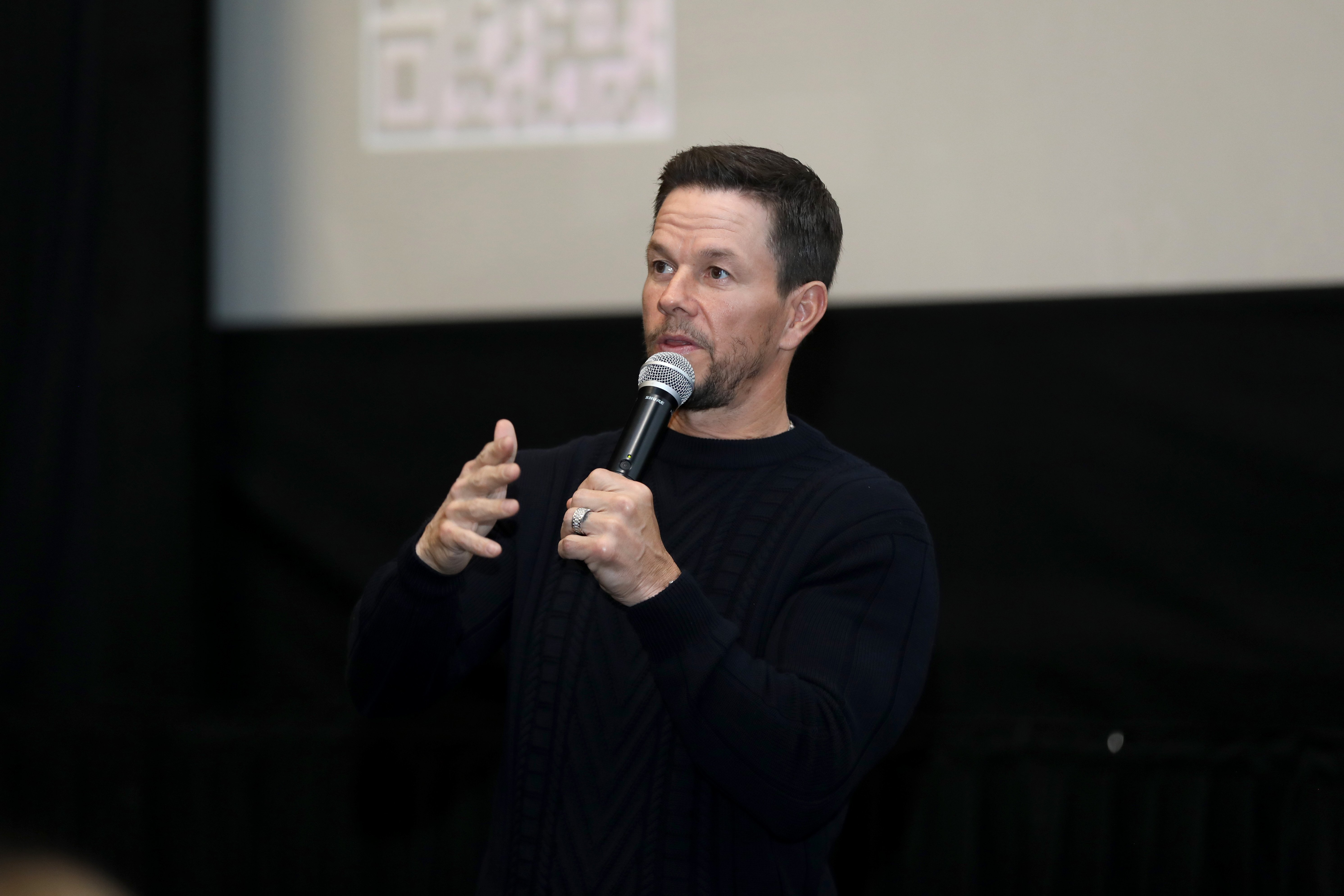 Mark Wahlberg from Boogie Nights speaks at a Boston special screening for his new movie Father Stu.