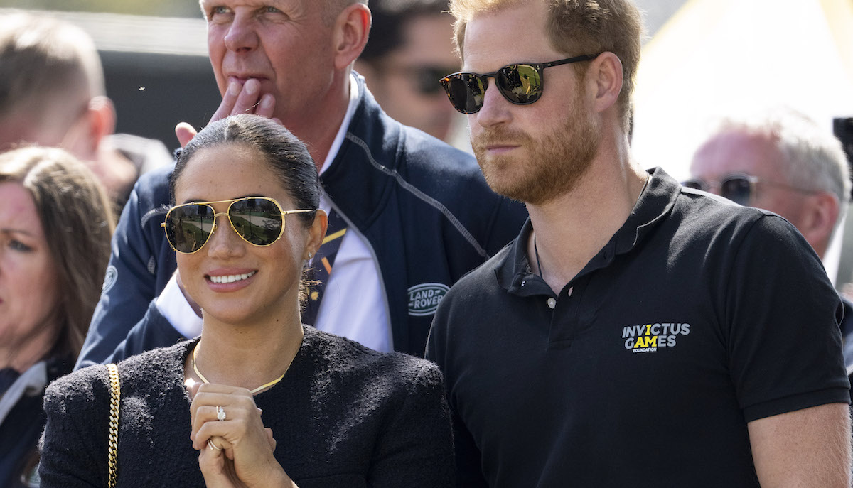 Meghan Markle and Prince Harry watch the Land Rover Challenge at the Invictus Games