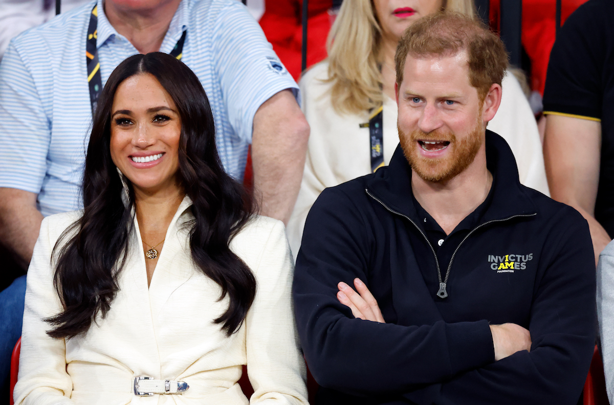 Meghan Markle and Prince Harry smile at the 2022 Invictus Games