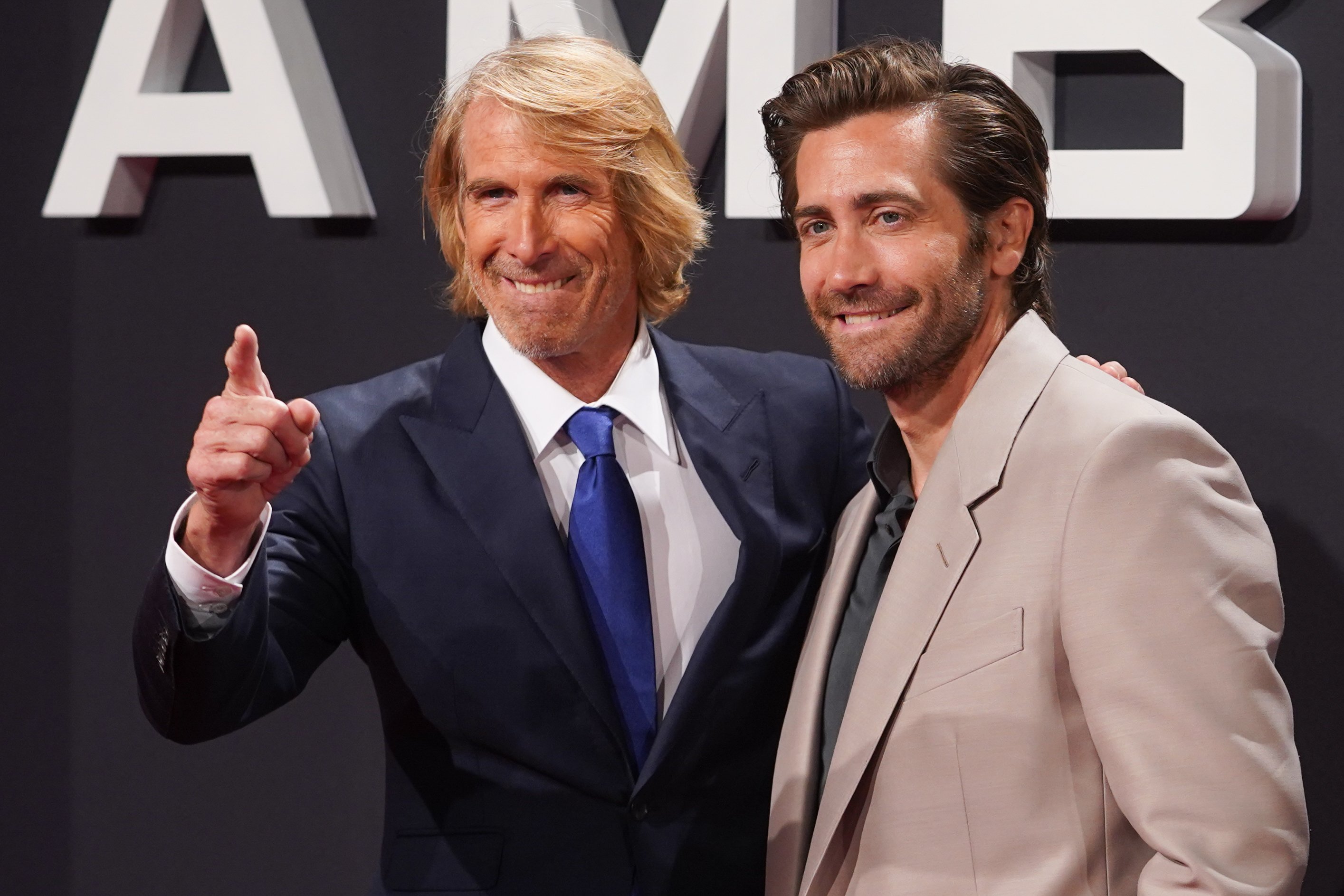 Michael Bay and Jake Gyllenhaal attend the premiere of the movie Ambulance.