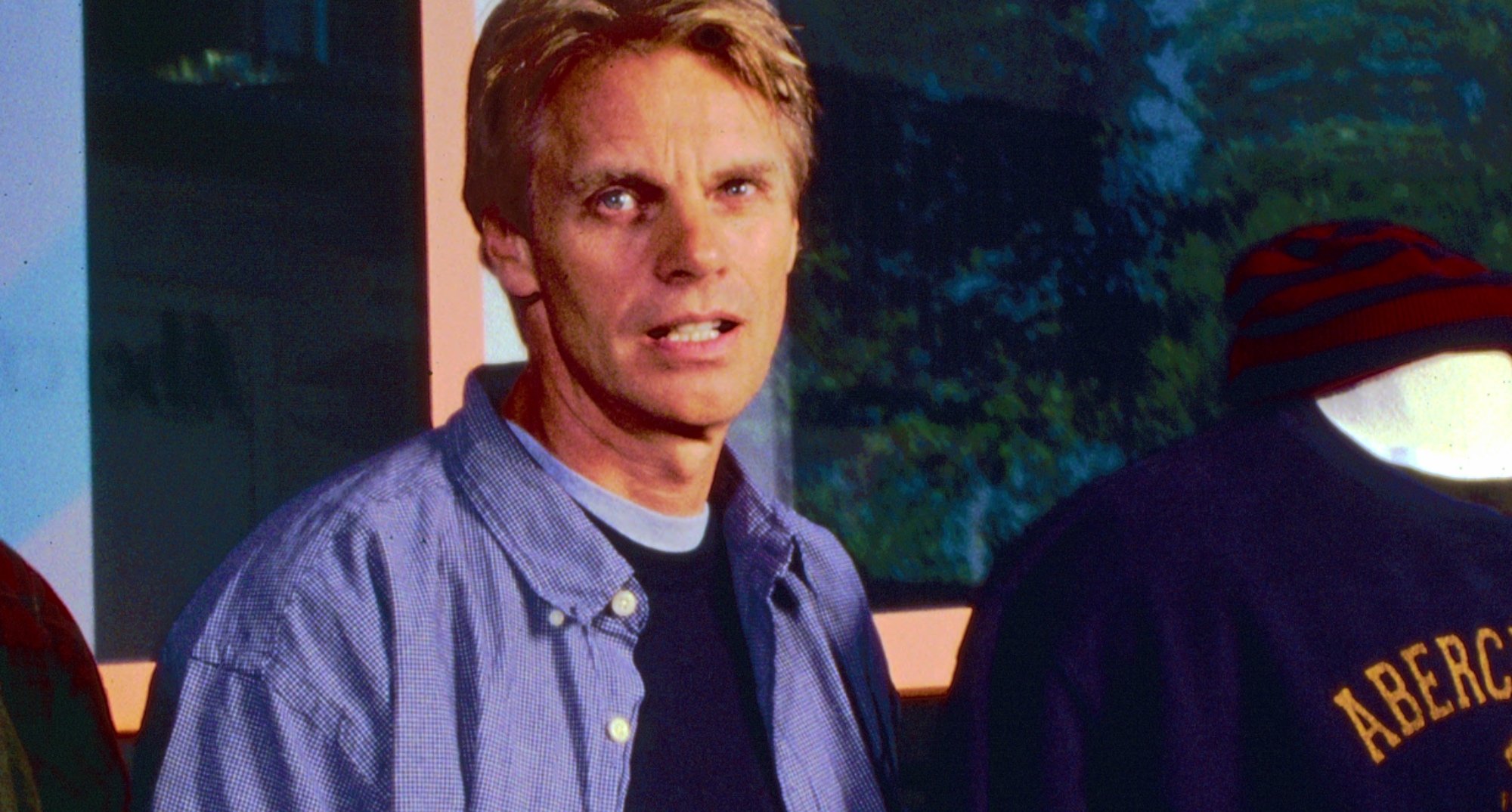 Mike Jeffries from 'White Hot: The Rise & Fall of Abercrombie & Fitch' next to mannequin.