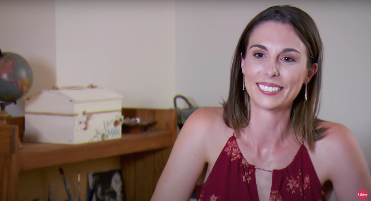 Smiling Mindy Shiben wearing a purple spaghetti strap top in 'Married at First Sight' Season 10