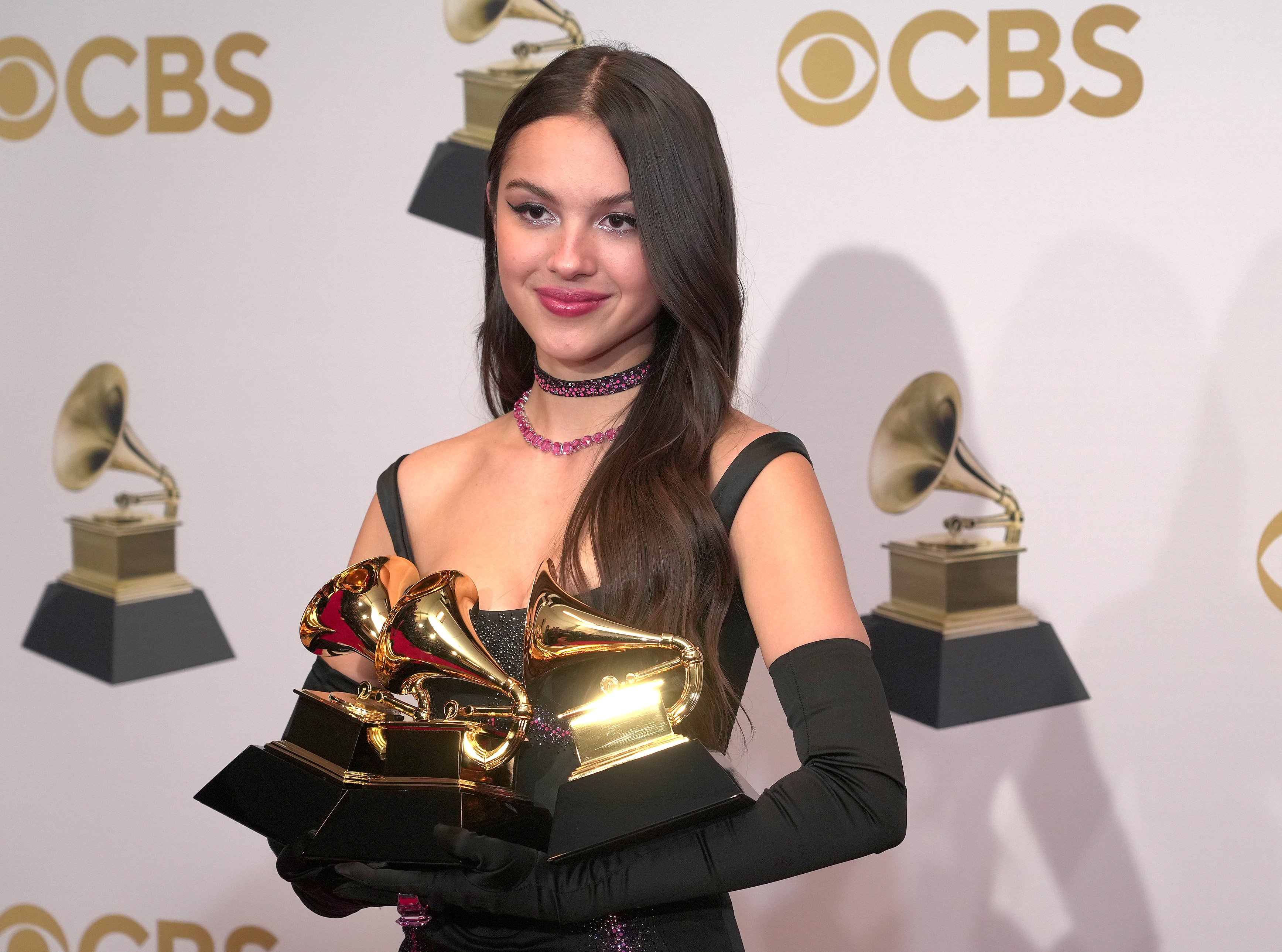 Olivia Rodrigo, winner of the Best New Artist and Best Pop Solo Performance Award for 'Drivers License' poses in the winners photo room during the 64th Annual GRAMMY Awards