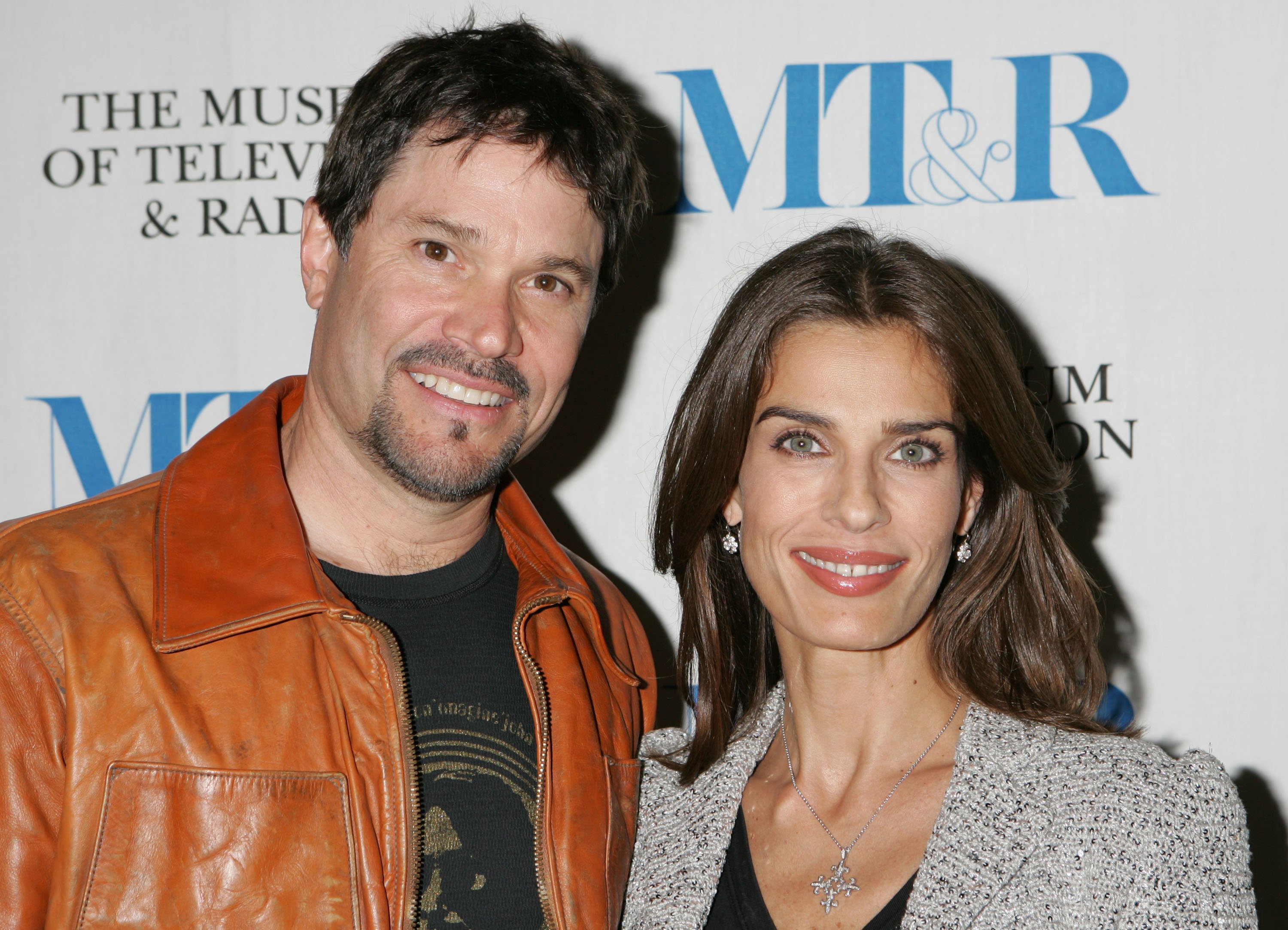 'Days of Our Lives' actor Peter Reckell in a black shirt and brown leather jacket; and Kristian Alfonso in a black blouse and grey jacket.