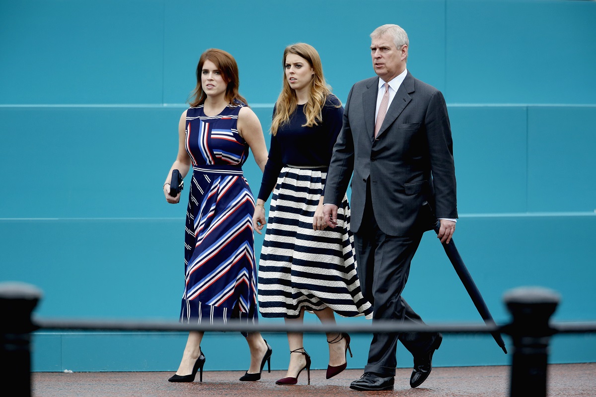 Prince Andrew photographed with Princess Beatrice and Princess Eugenie prior to a walkabout