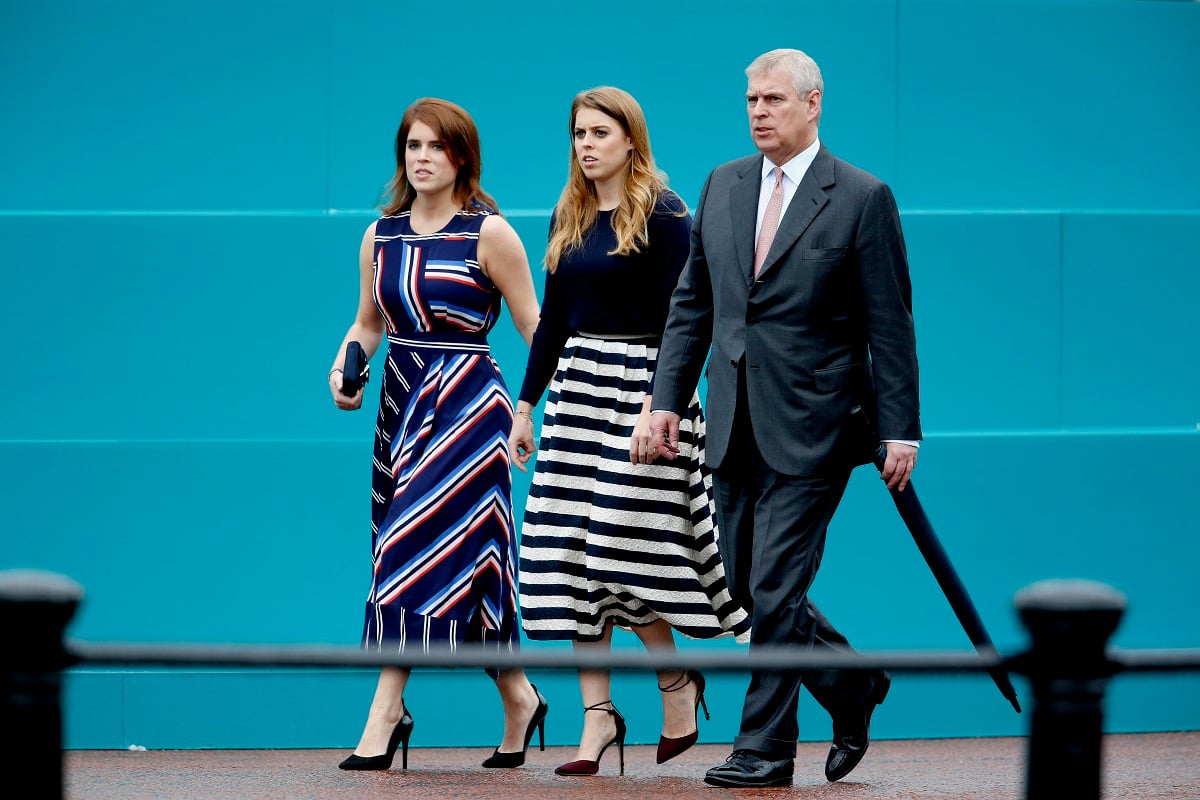 Prince Andrew photographed with Princess Beatrice and Princess Eugenie prior to a walkabout