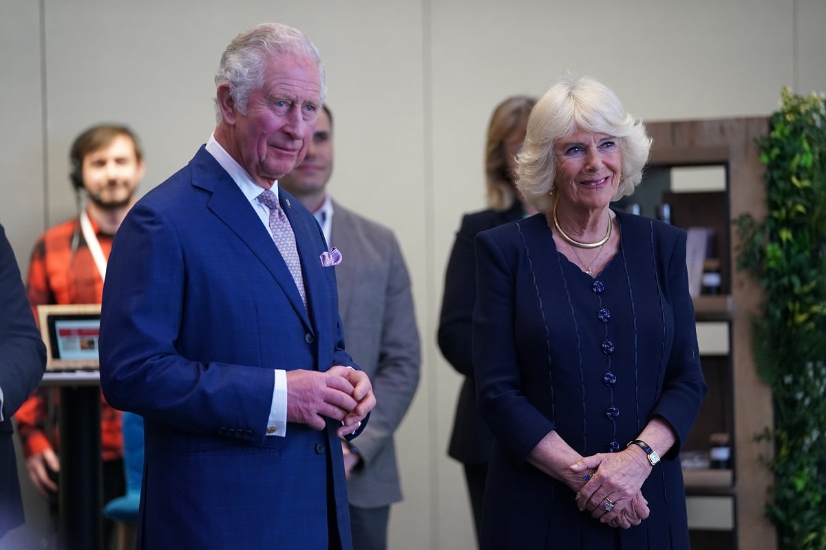 Prince Charles and Camilla Parker Bowles standing next to each other at the official opening of the new Meta offices in north London
