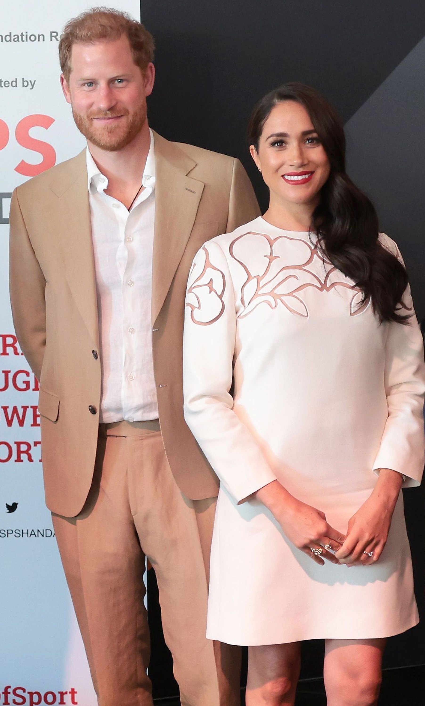 Prince Harry and Meghan Markle pose for a photo at the IGF Reception during day two of the Invictus Games