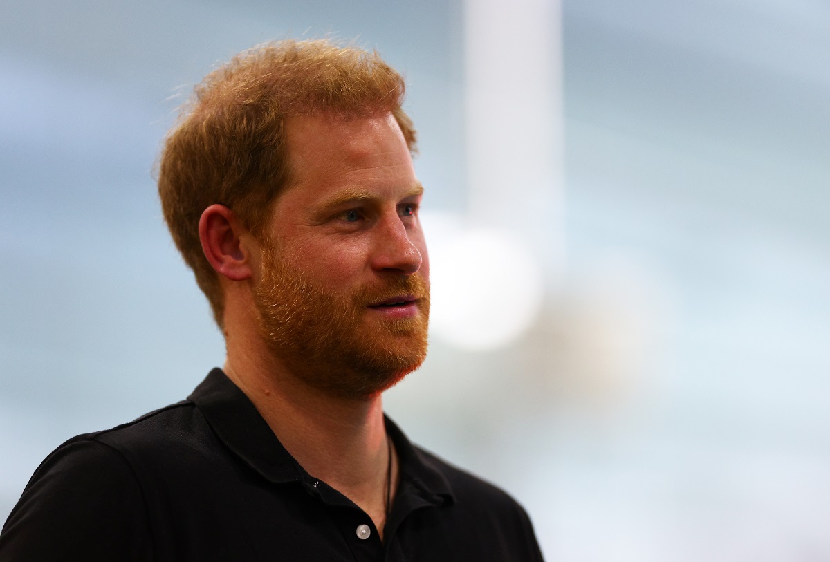 Prince Harry, who dodged questions about Prince William and Prince Charles in a new interview, looks on during the medal ceremony for the Women's 50m Breaststroke at Invictus Games