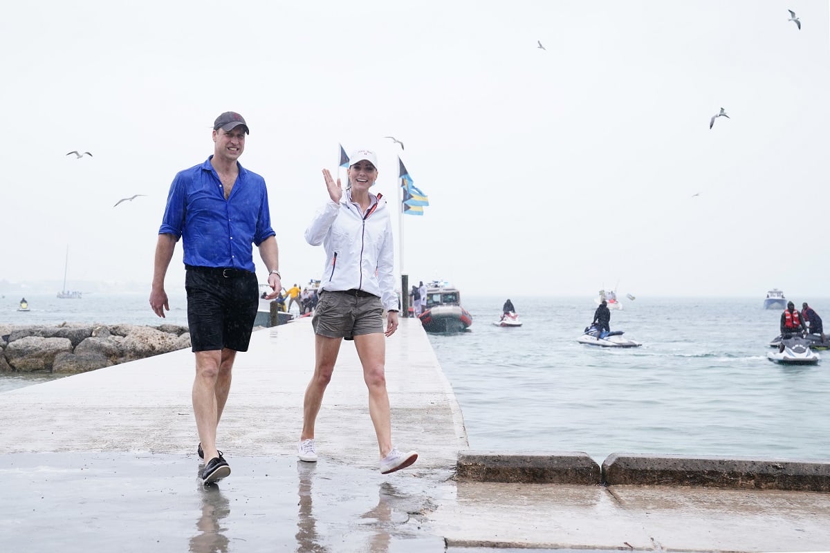 Prince William and Kate Middleton, who went on a scuba dive while in Belize, wave to the crowd after taking part in the Bahamas Platinum Jubilee Sailing Regatta 