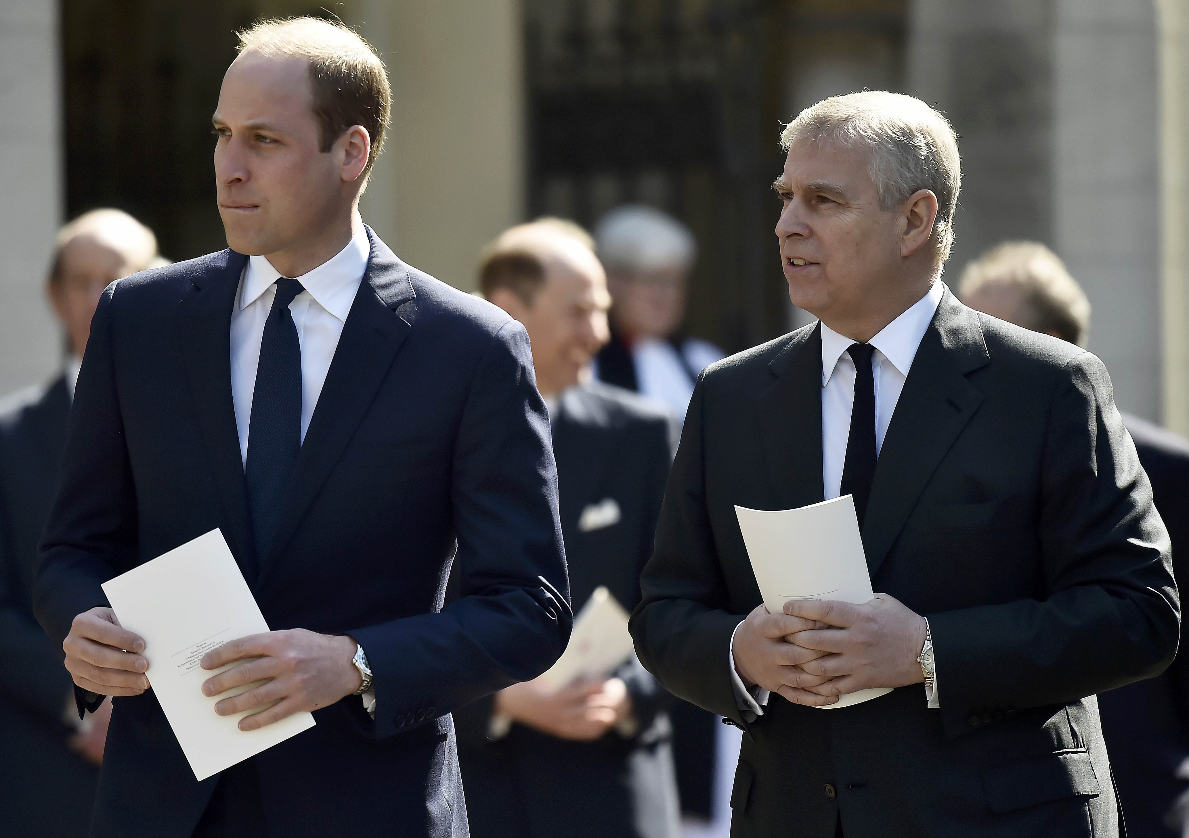 Prince William standing next to Prince Andrew who he reportedly wants to “banish” from the royal family