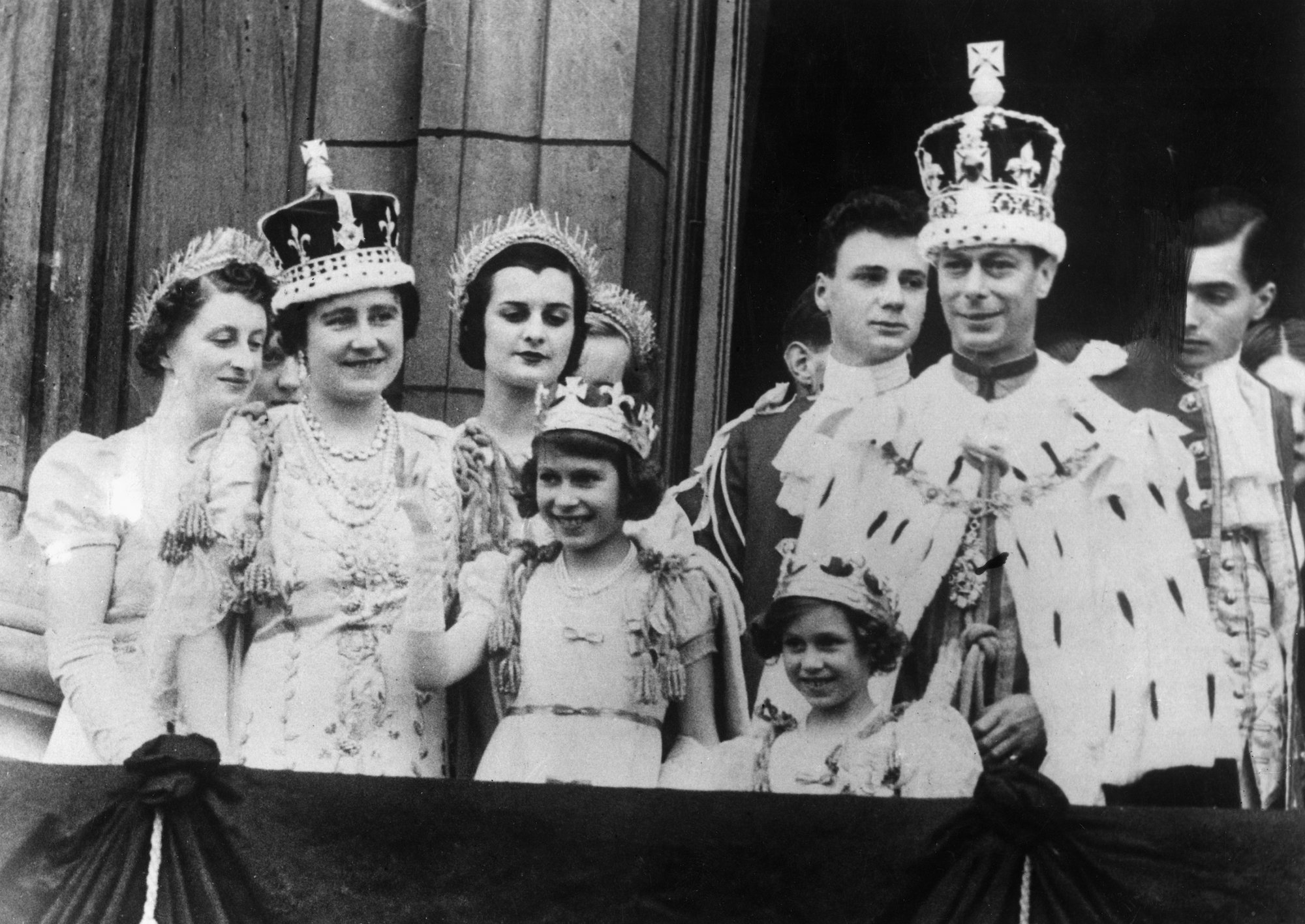 The British Royal Family appearing on the Buckingham Palace balcony and greeting the crowd after the coronation of George VI. London, 12th May 1937 