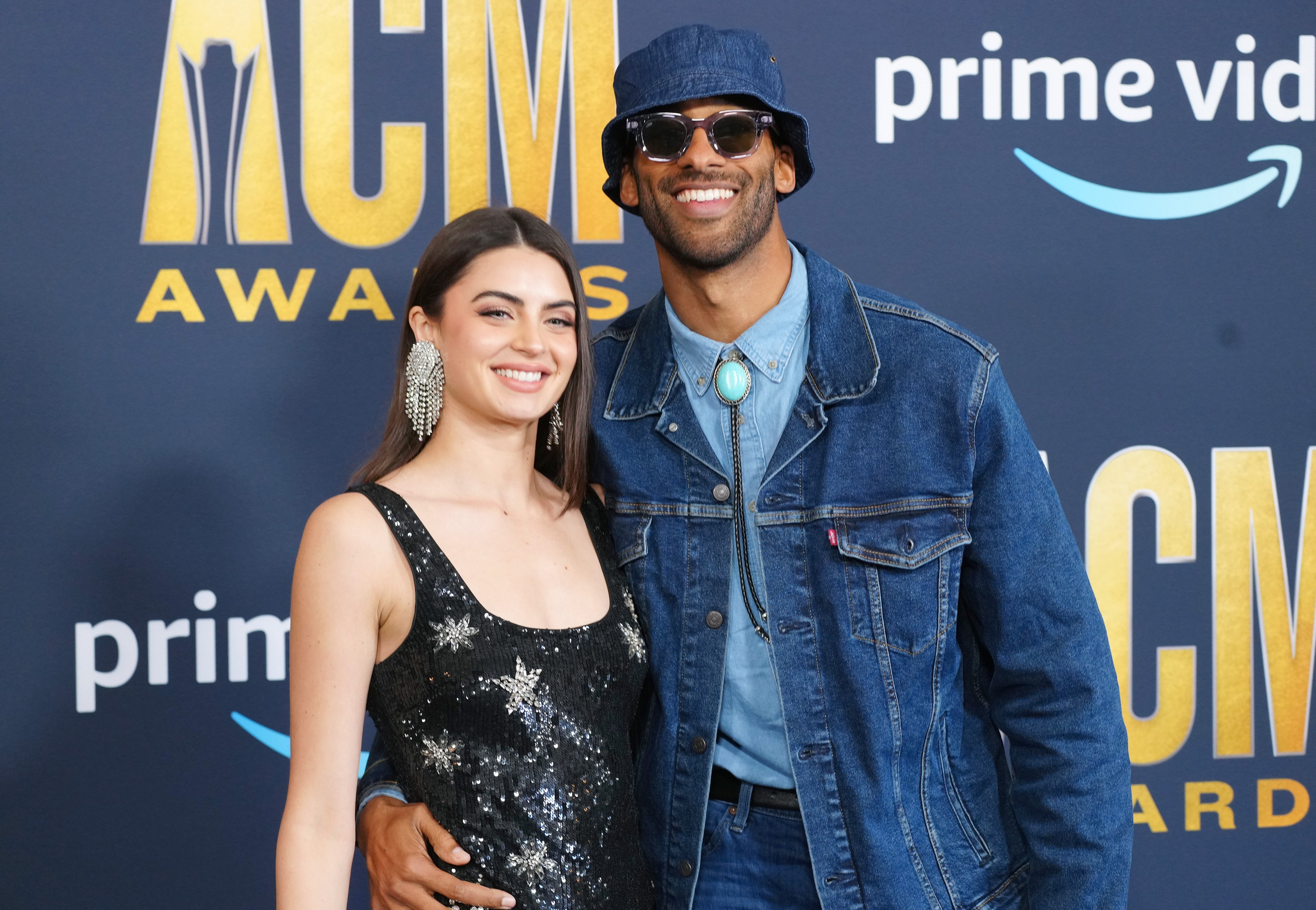 Rachael Kirkconnell and Matt James smile for cameras at the 57th Academy of Country Music Awards