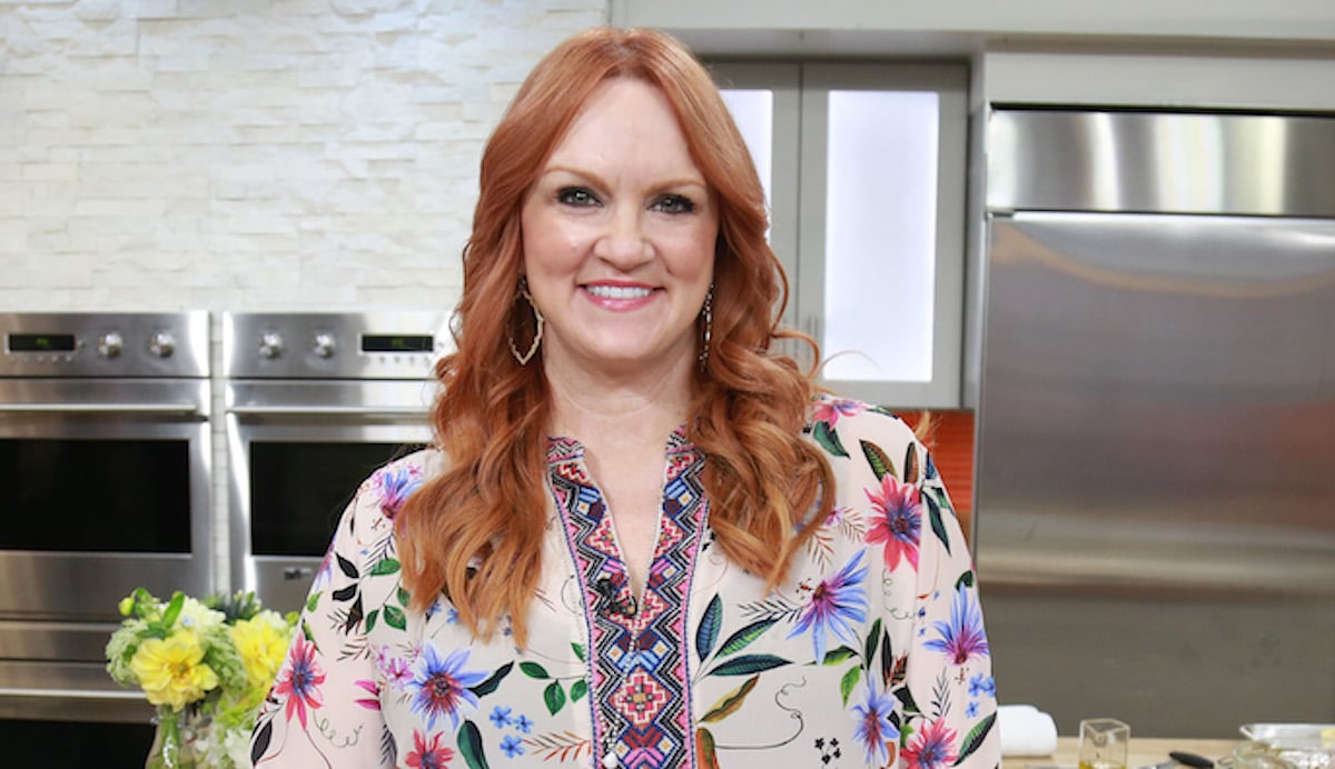Ree Drummond, creator of Pioneer recipe Puff Pastry Braid, smiles wearing a floral shirt
