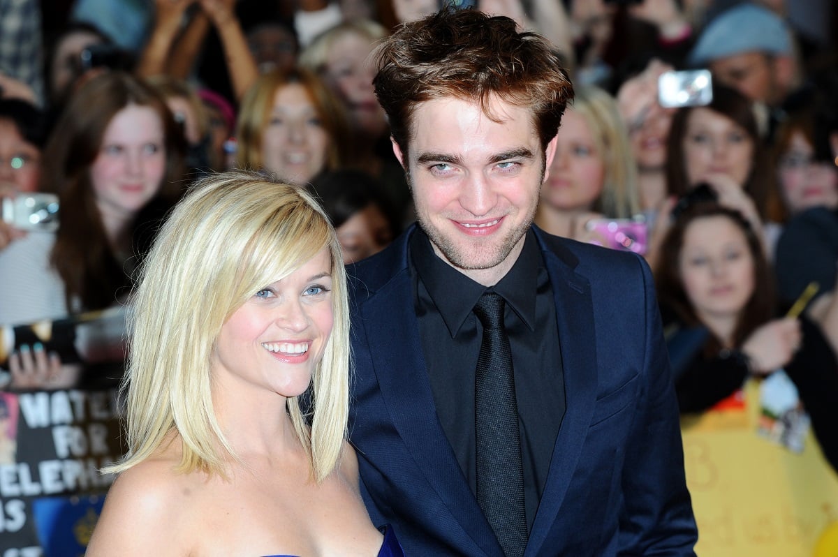 Robert Pattinson smiling with Reese Witherspoon