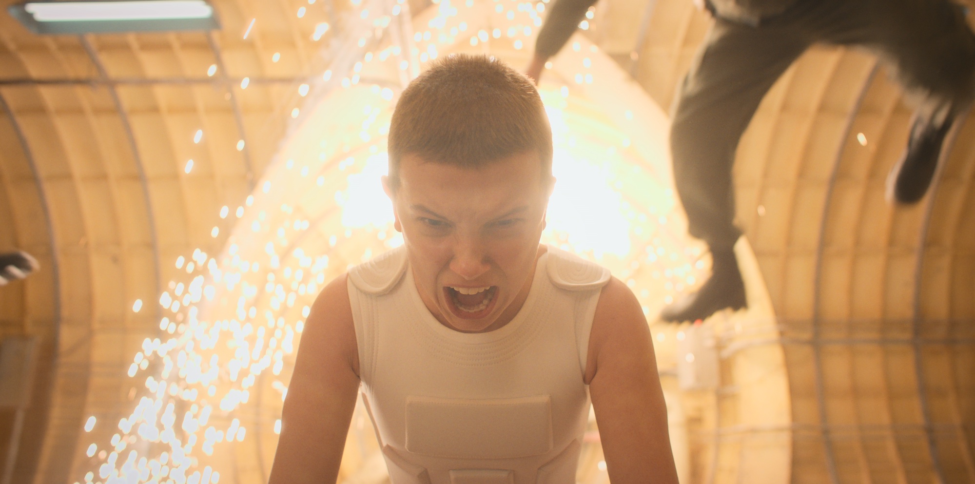 'Stranger Things 4' star Millie Bobby Brown using her powers in a production still from the upcoming season.